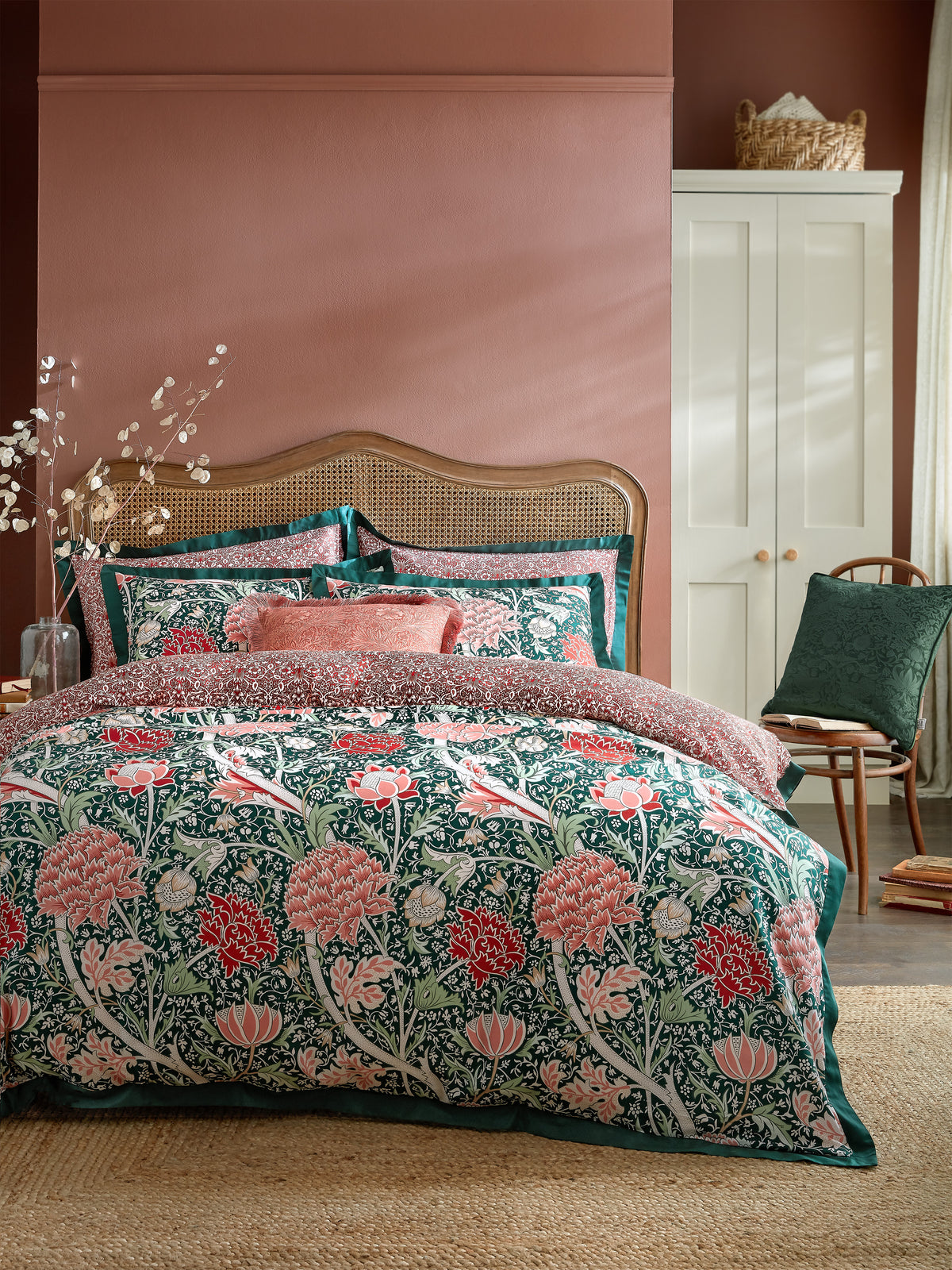 From the William Morris At Home AW26 collection by Ashley Wilde Group, Cray bed set in Forest Green and Cranberry. The reverse is the Borage print in Cranberry. Priced from £65 for a single bed set.