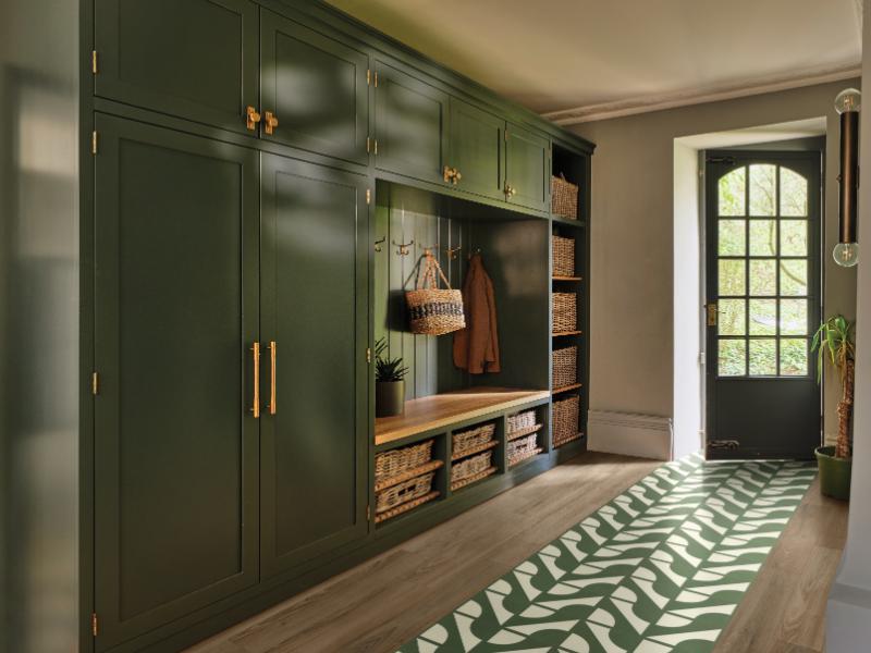 Karndean's Knight Tile Curio in Sage used as a walkway between Duxbury Acacia flooring, also from the Knight Tile collection. 